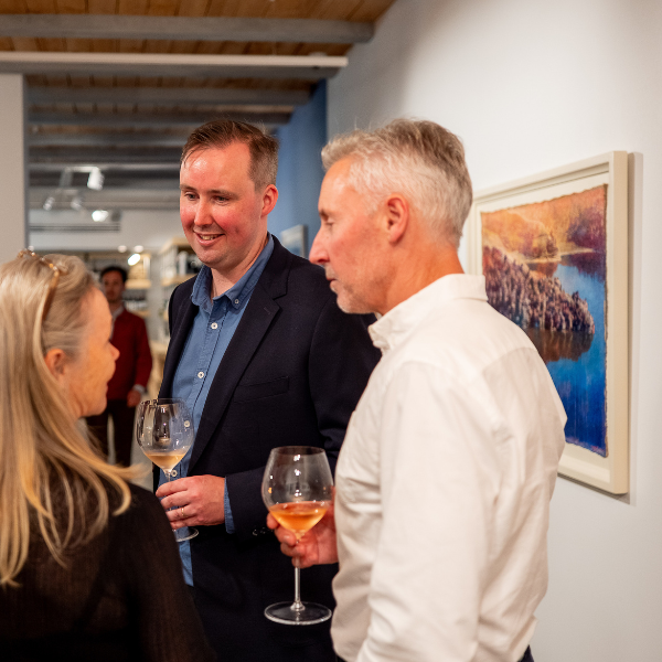 Regional Manager Tom Mapplebeck with guests at the Normanby Fine Wines Opening